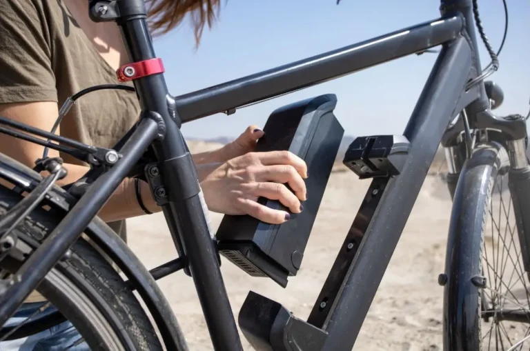 A person working on reviews of components of ebikes