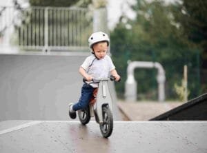 A child riding an electric balance bike