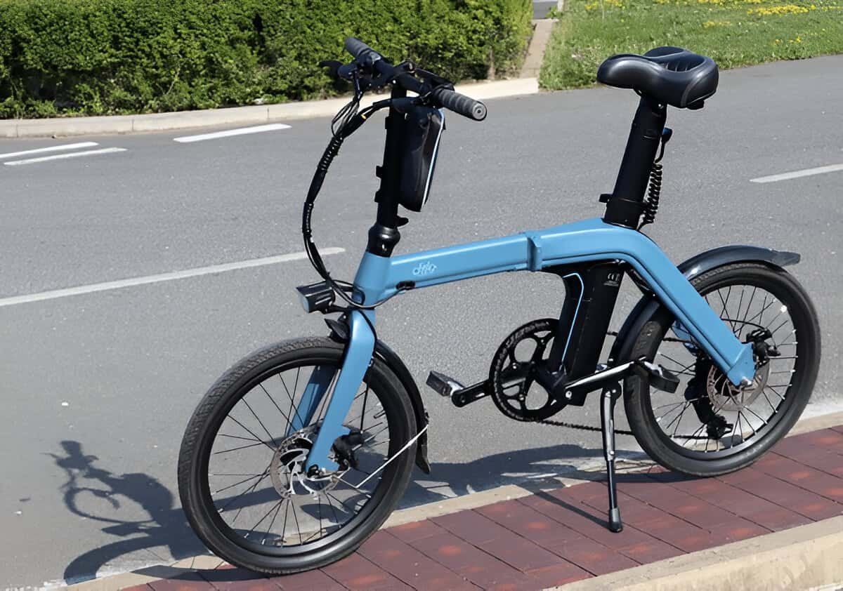 A Jetson Bolt Folding Electric Ride-On Bike standing on a cycling track