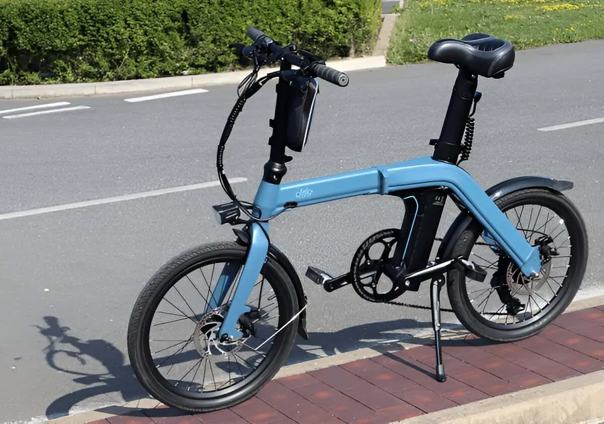A Jetson Bolt Folding Electric Ride-On Bike standing on a cycling track